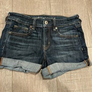 Dark blue rolled jean shorts
